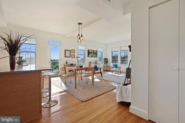 a view of a living room and dining room