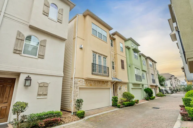 a front view of a multi story residential apartment building