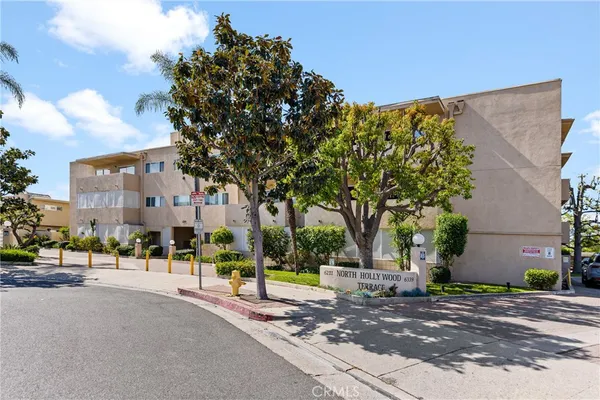 a view of a street with a building