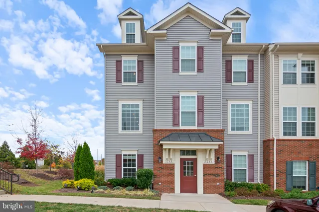 a front view of a multi story residential apartment building