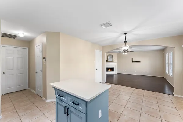 a view of a kitchen with a sink