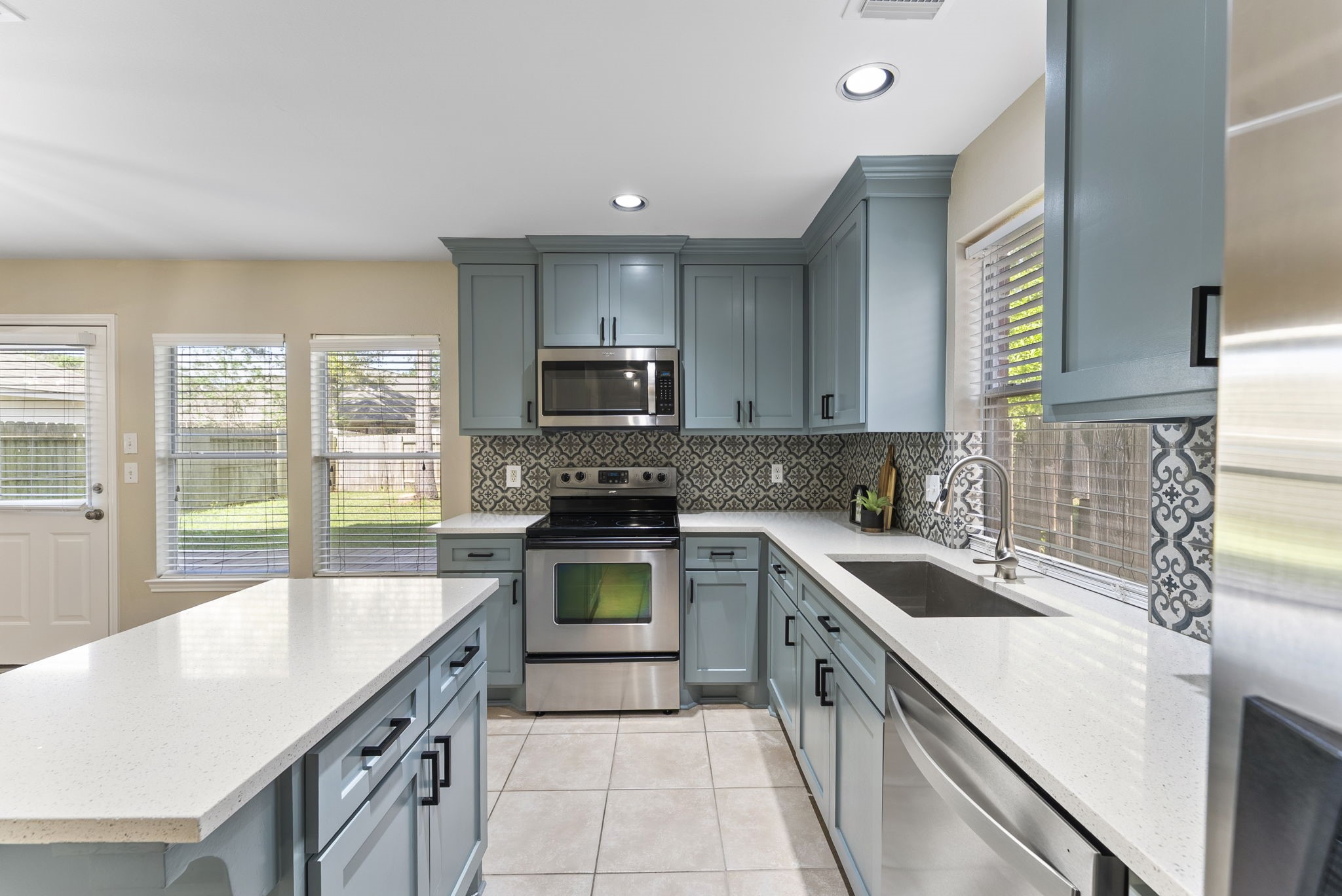 2419 Colonial Springs Lane Spring, TX 77386 - Photo 19 of 35 The oven is stubbed for gas so could be changed out for a gas range.
