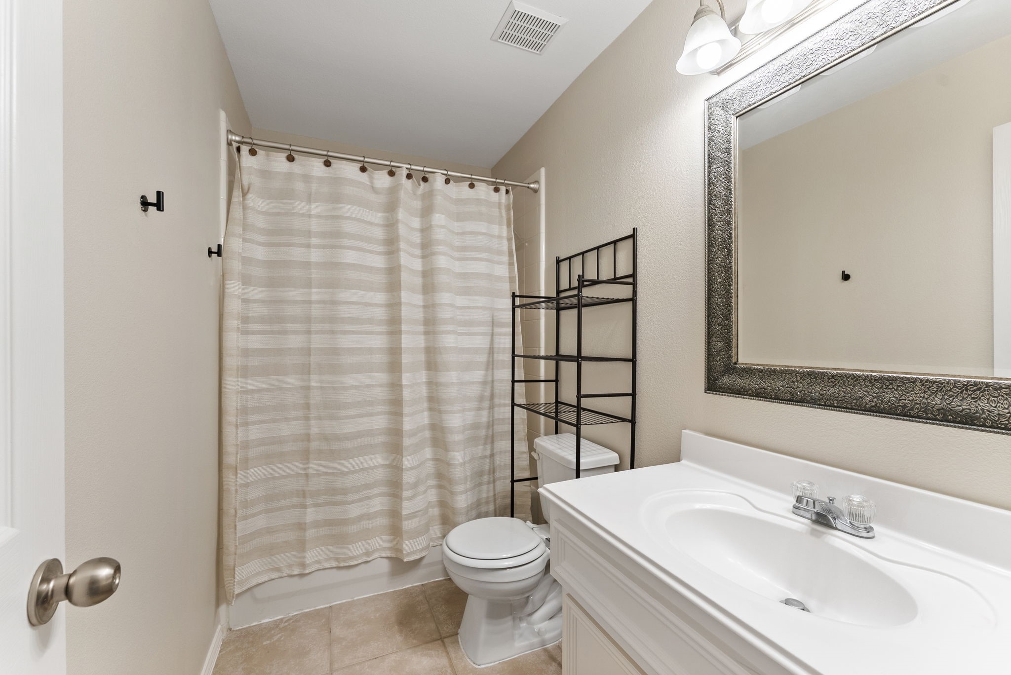 2419 Colonial Springs Lane Spring, TX 77386 - Photo 24 of 35 Full bathroom is between the secondary bedrooms.