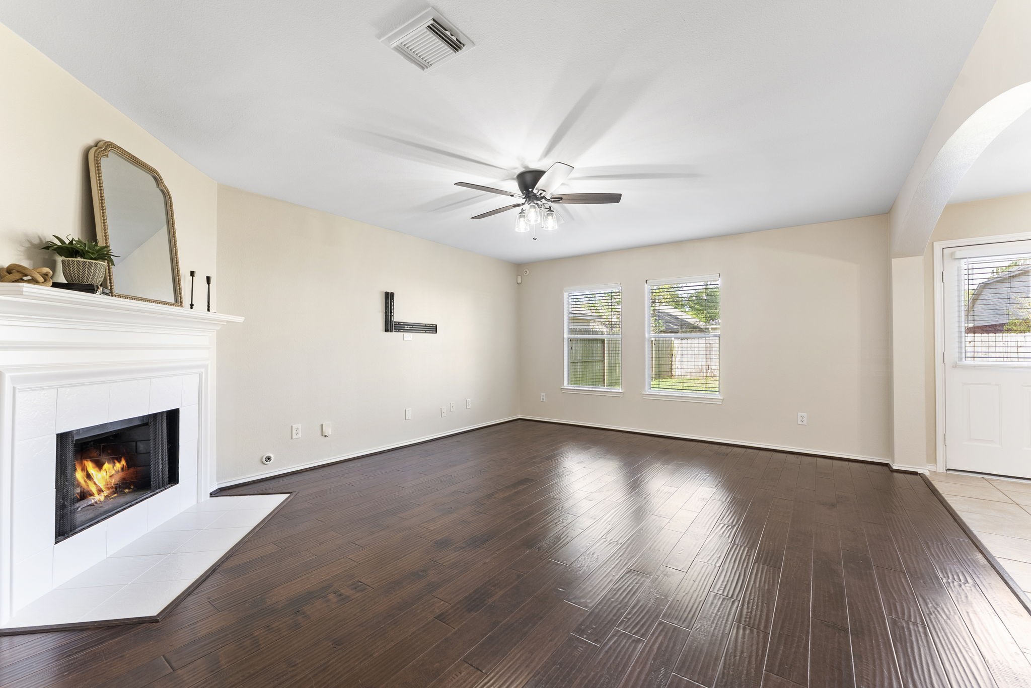 2419 Colonial Springs Lane Spring, TX 77386 - Photo 7 of 35 Living room is just past the formal dining room. Enjoy a charming fire on a cool day.