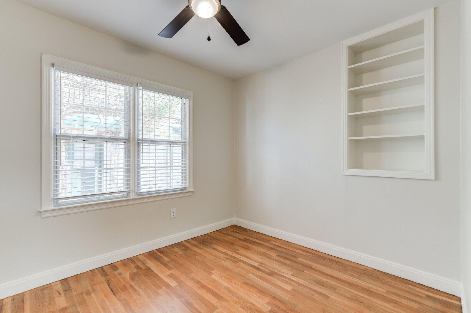 2710 27th Street Lubbock, TX 79410 - Photo 26 of 38 an empty room with a window