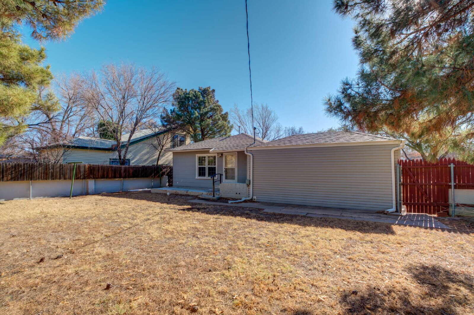 2710 27th Street Lubbock, TX 79410 - Photo 36 of 38 a house that has a tree in front of it