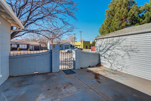 a view of a room with stairs and a table and chair