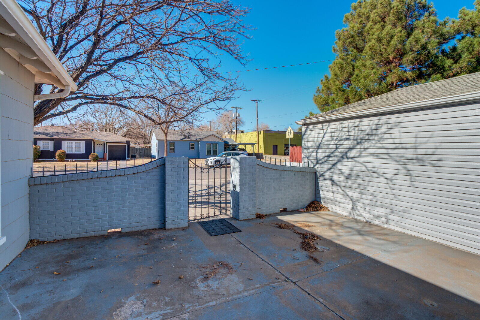 2710 27th Street Lubbock, TX 79410 - Photo 5 of 38 a view of a room with stairs and a table and chair