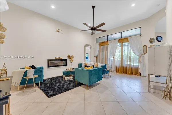a living room with furniture and a window
