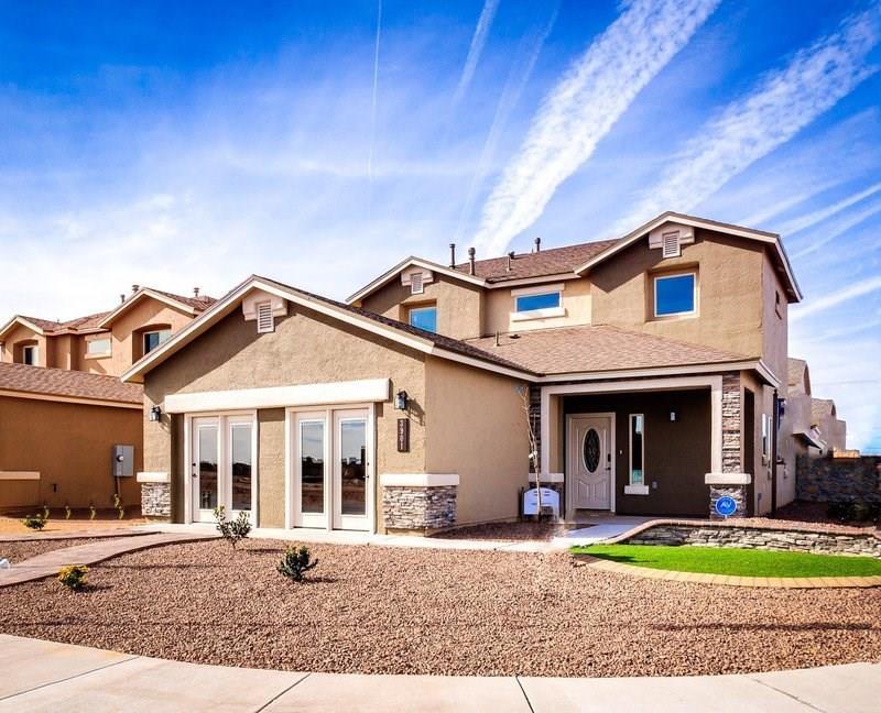 13313 Tuggle Road El Paso, TX 79928 - Photo 1 of 1 a front view of a house with a yard