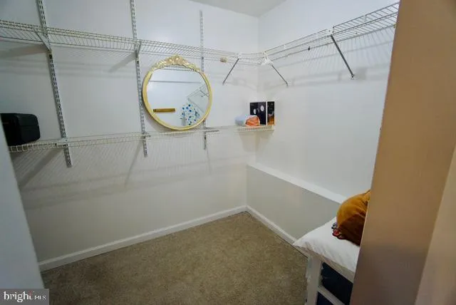 a room with cabinets and a window