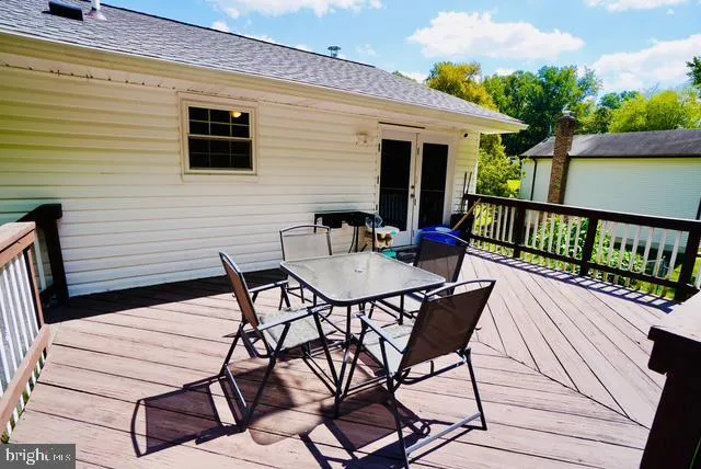 a view of a outdoor seating area with furniture