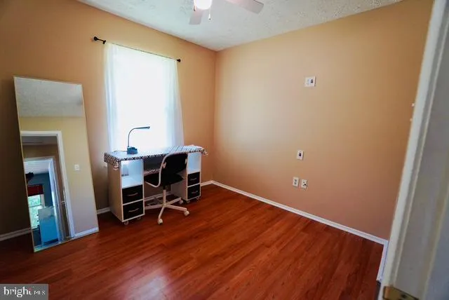 a workspace with wooden floor