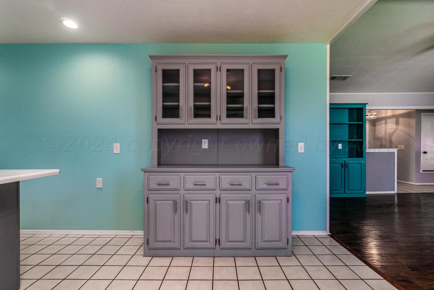 8012 Simpson Drive Amarillo, TX 79121 - Photo 12 of 28 a kitchen with a stove