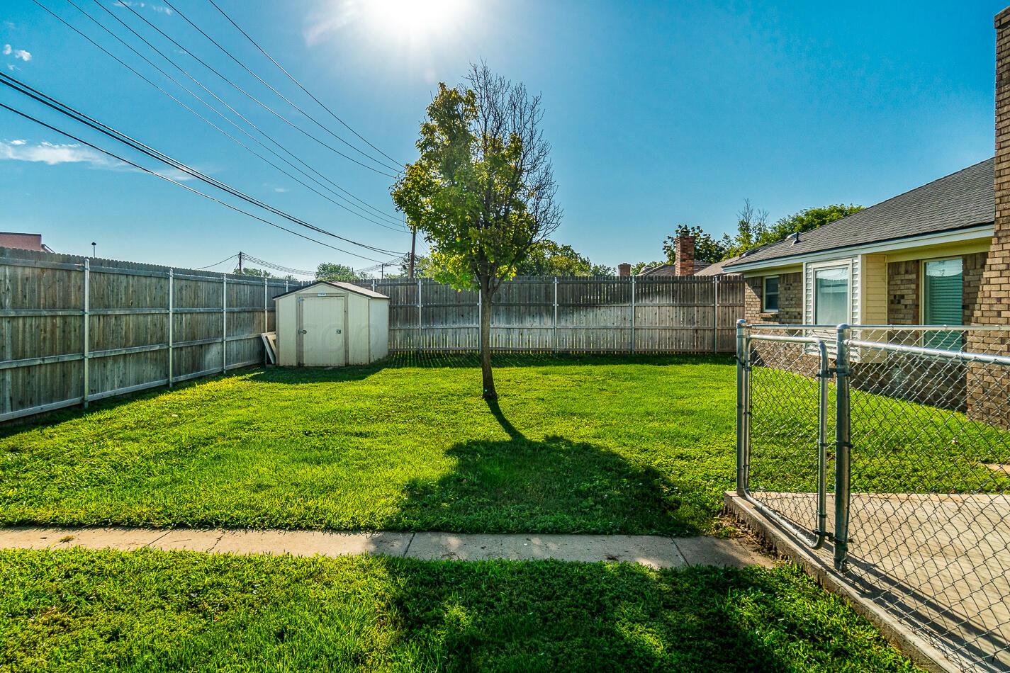8012 Simpson Drive Amarillo, TX 79121 - Photo 28 of 28 a view of a house with backyard