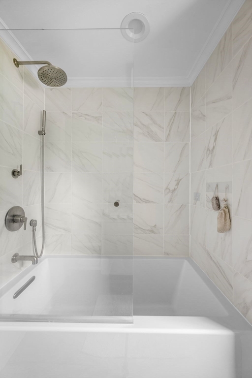 8 Baker Avenue Beverly, MA 01915 - Photo 23 of 40 a bathroom with a bathtub