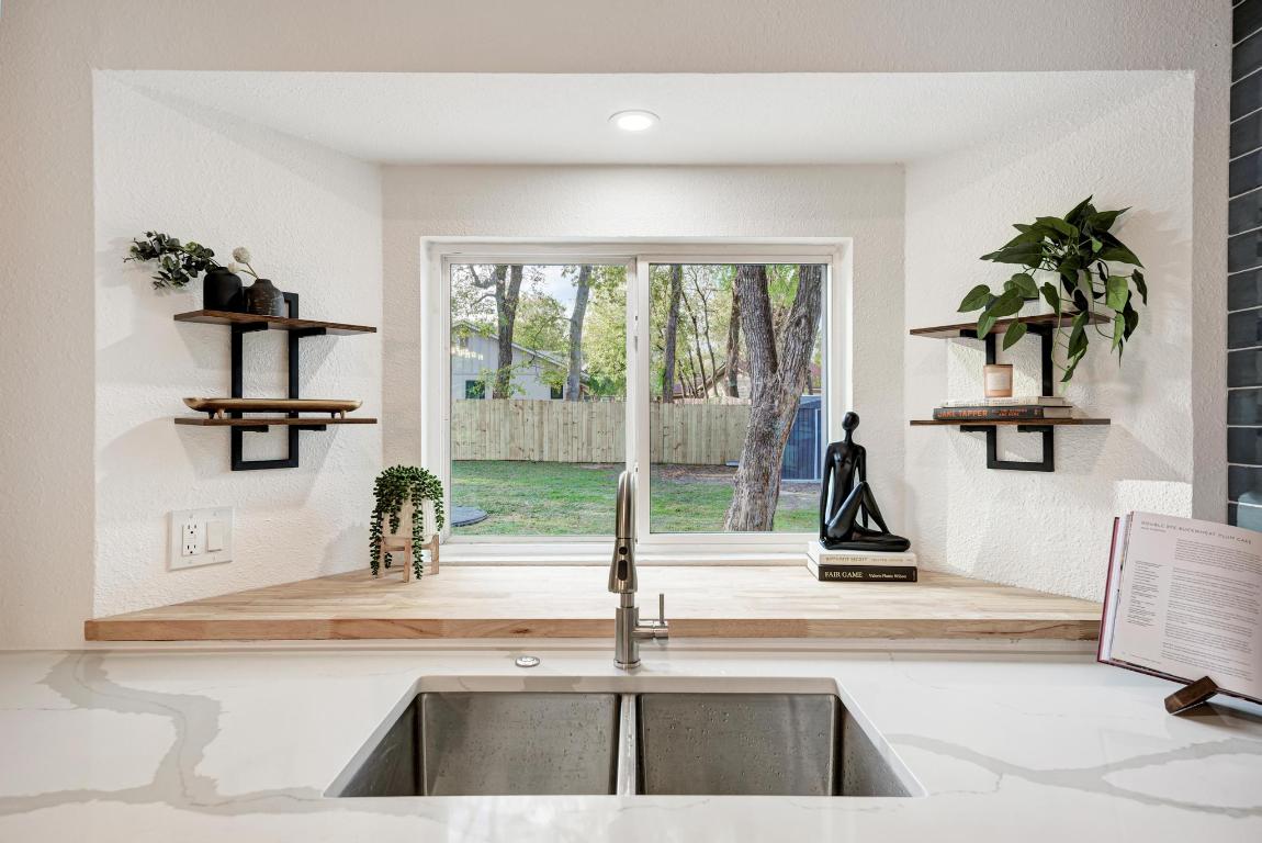 5106 Regency Drive Austin, TX 78724 - Photo 16 of 37 a view of a living room and bathroom