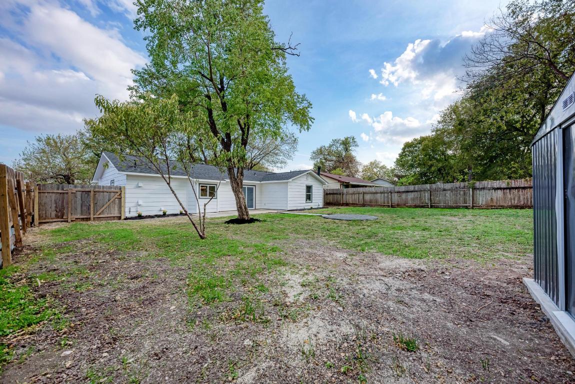 5106 Regency Drive Austin, TX 78724 - Photo 33 of 37 a view of a house with yard and a tree