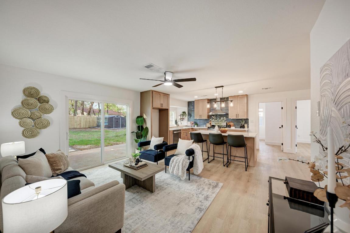5106 Regency Drive Austin, TX 78724 - Photo 10 of 37 a living room with furniture and a large window