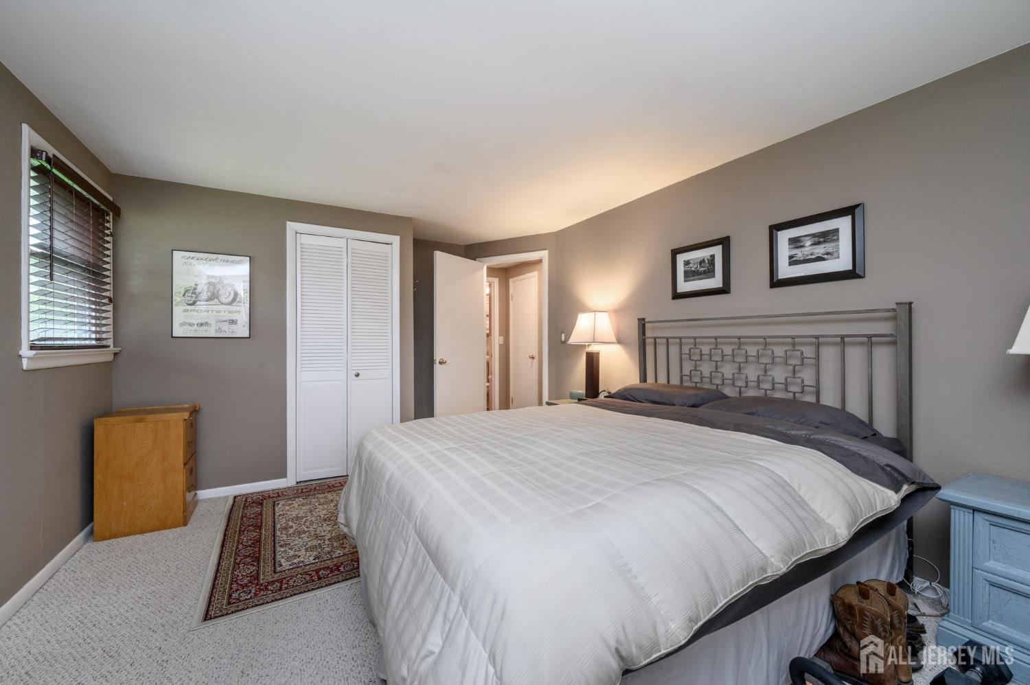 5 Locust Street Netcong, NJ 07857 - Photo 16 of 34 a bedroom with a bed and a couch