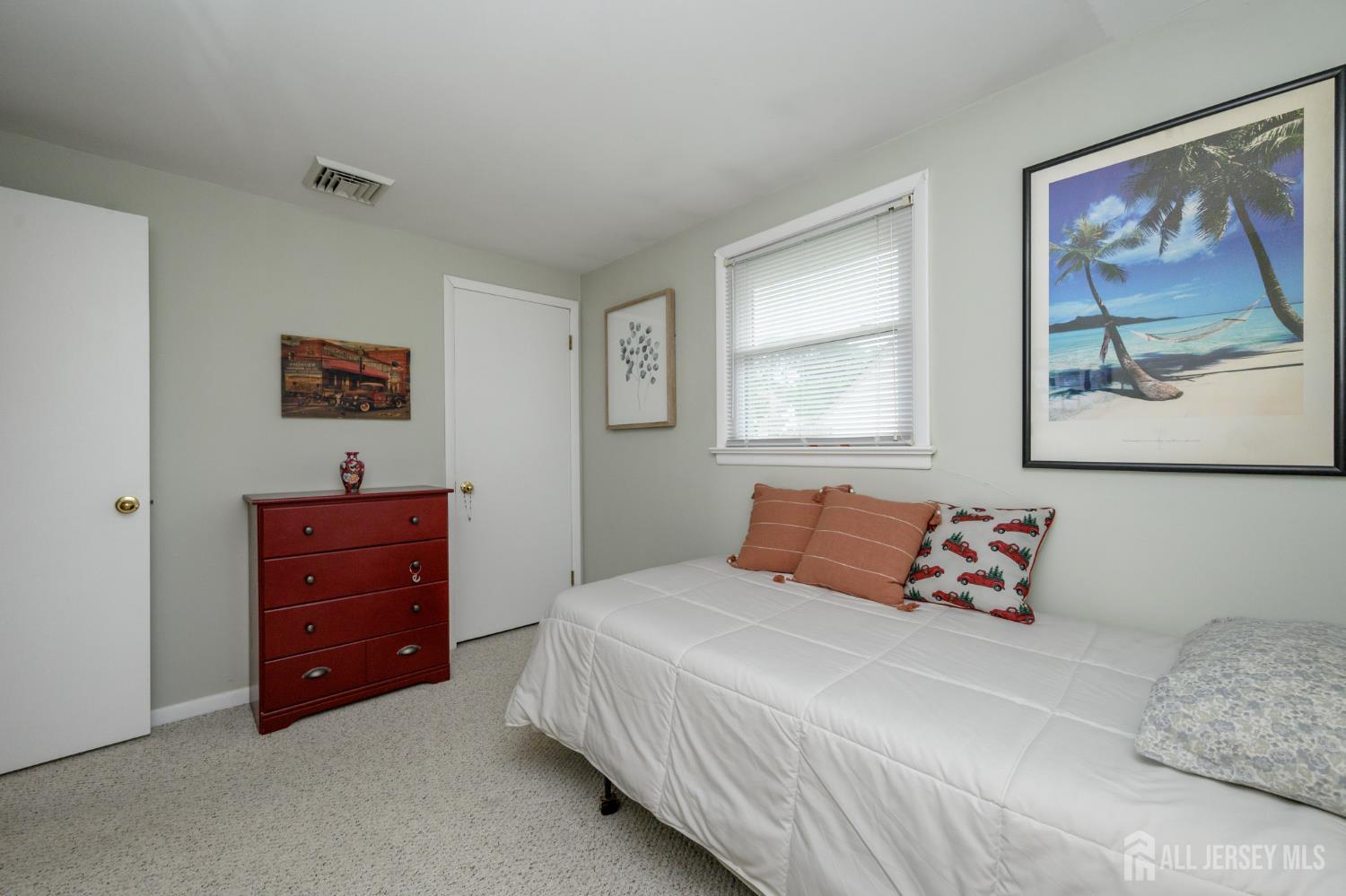 5 Locust Street Netcong, NJ 07857 - Photo 18 of 34 a bedroom with a bed and a painting on the wall