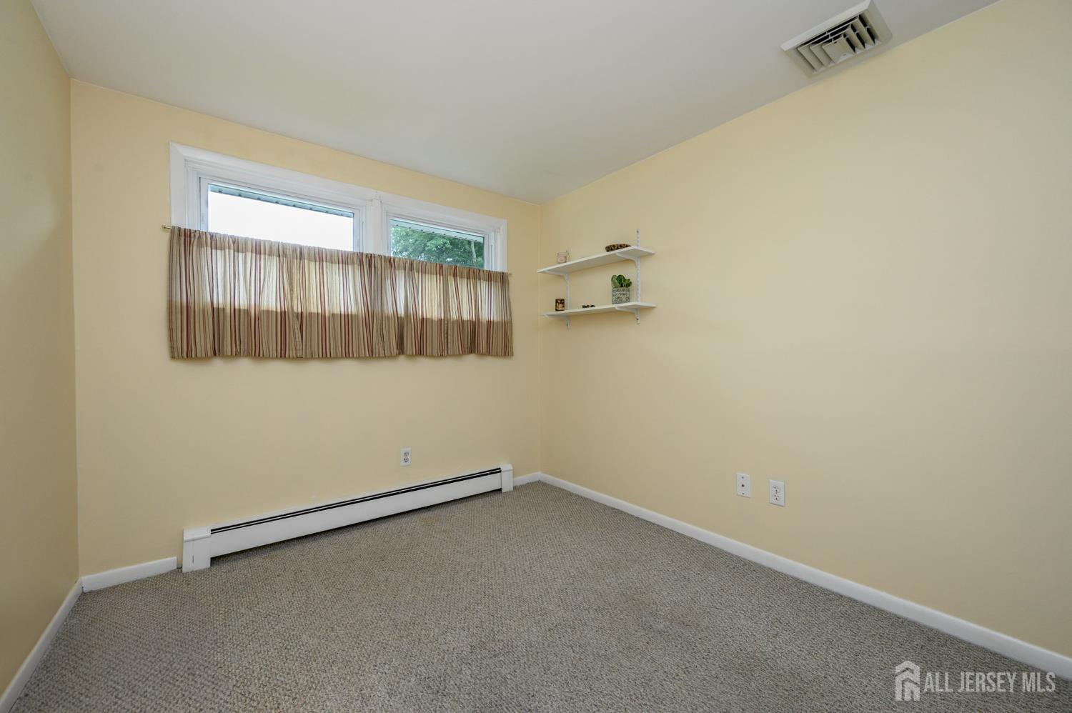 5 Locust Street Netcong, NJ 07857 - Photo 23 of 34 an empty room with a window