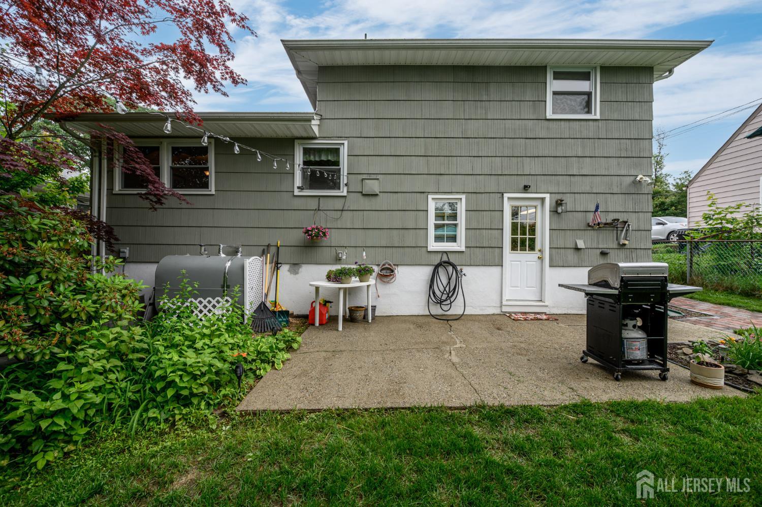5 Locust Street Netcong, NJ 07857 - Photo 24 of 34 a view of a chair and table in backyard of the house