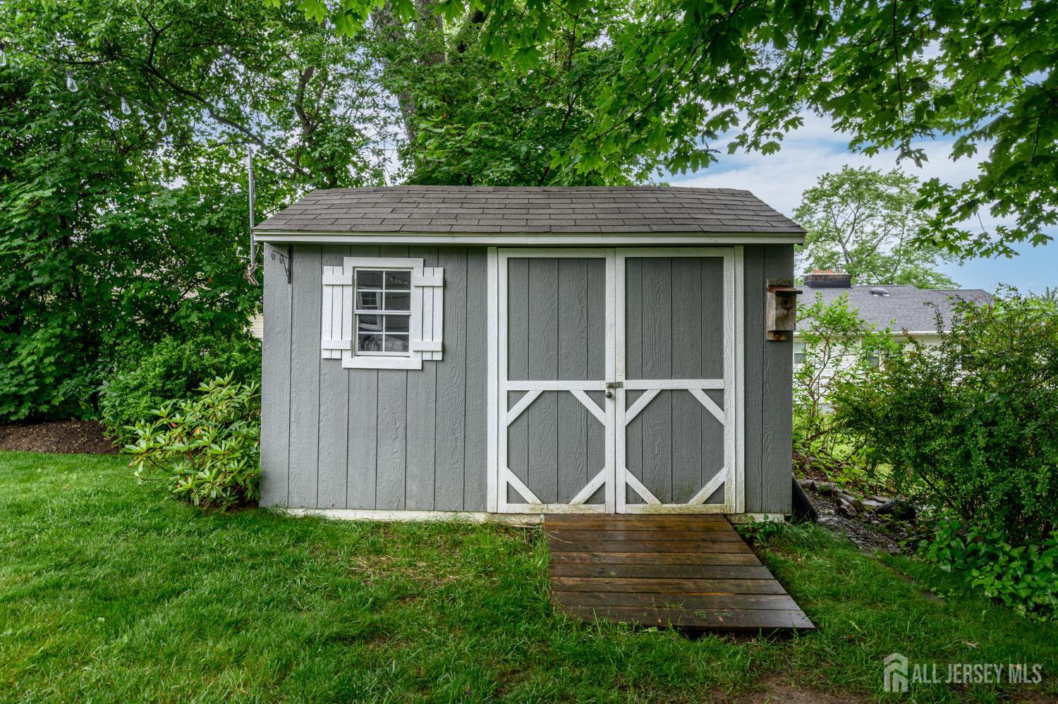 5 Locust Street Netcong, NJ 07857 - Photo 26 of 34 a backyard of a house with table and chairs