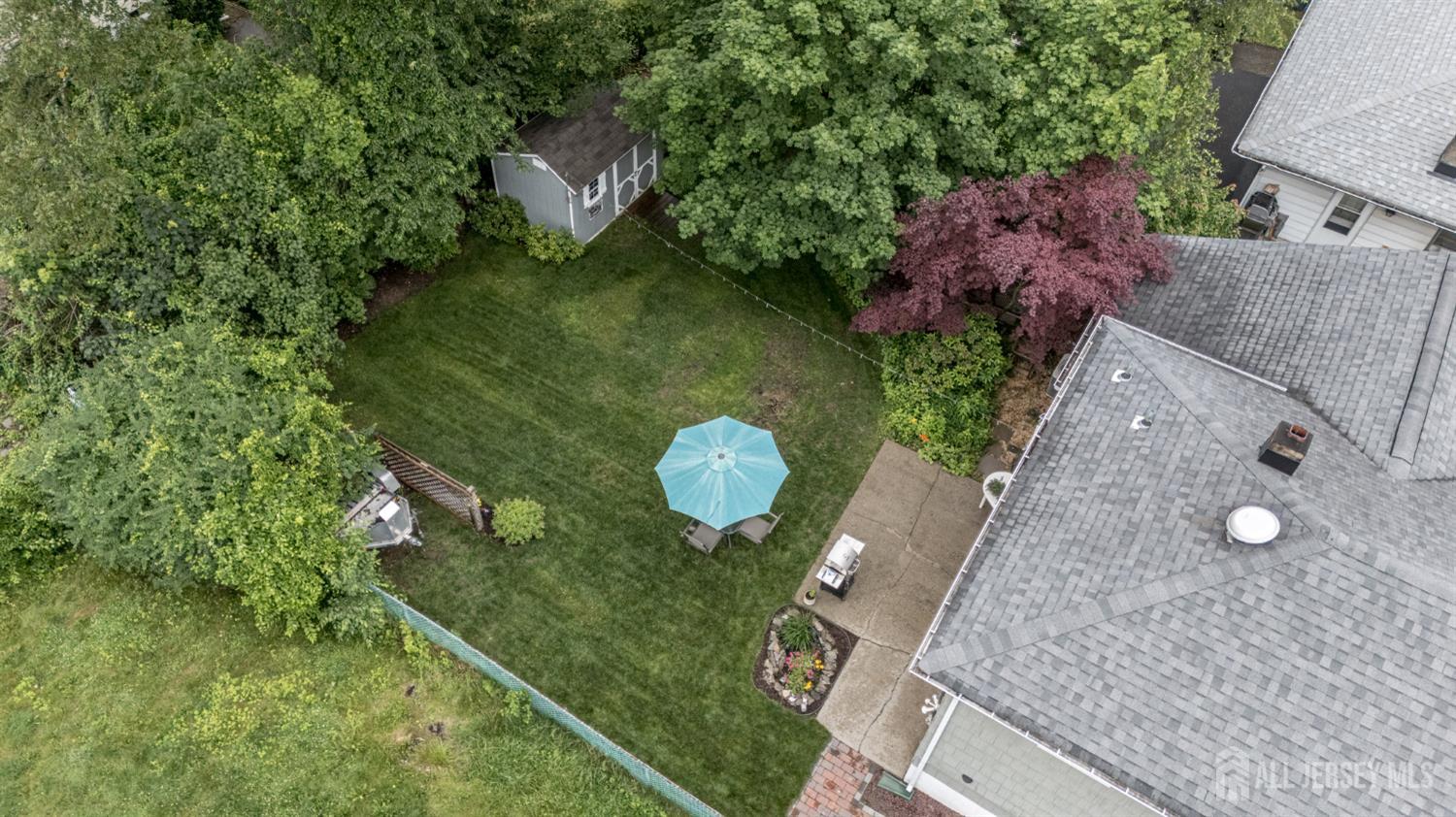 5 Locust Street Netcong, NJ 07857 - Photo 28 of 34 an aerial view of a house with a yard and outdoor seating