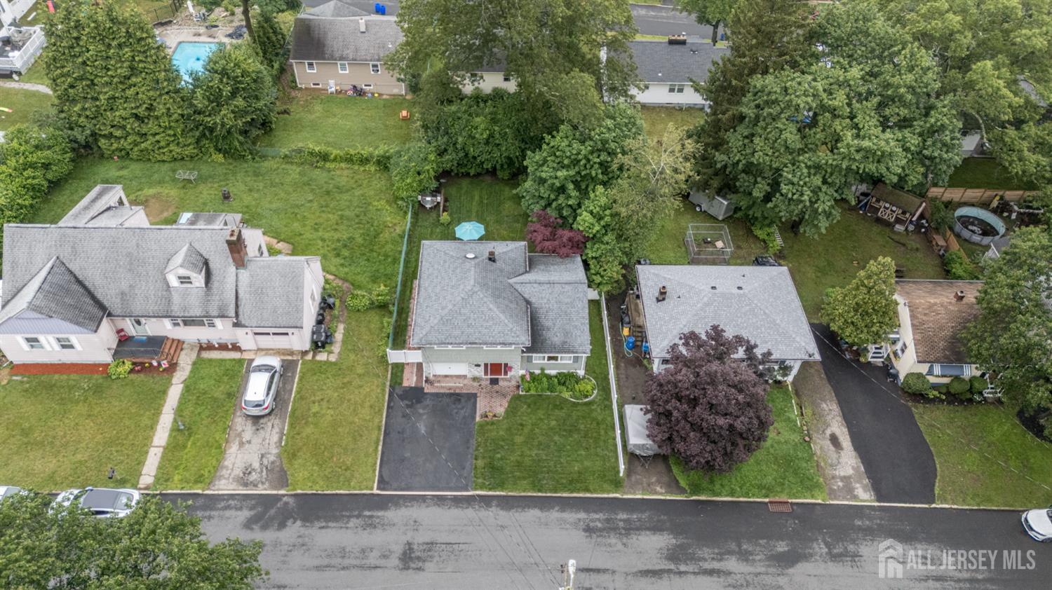 5 Locust Street Netcong, NJ 07857 - Photo 29 of 34 an aerial view of a house with a garden and a yard