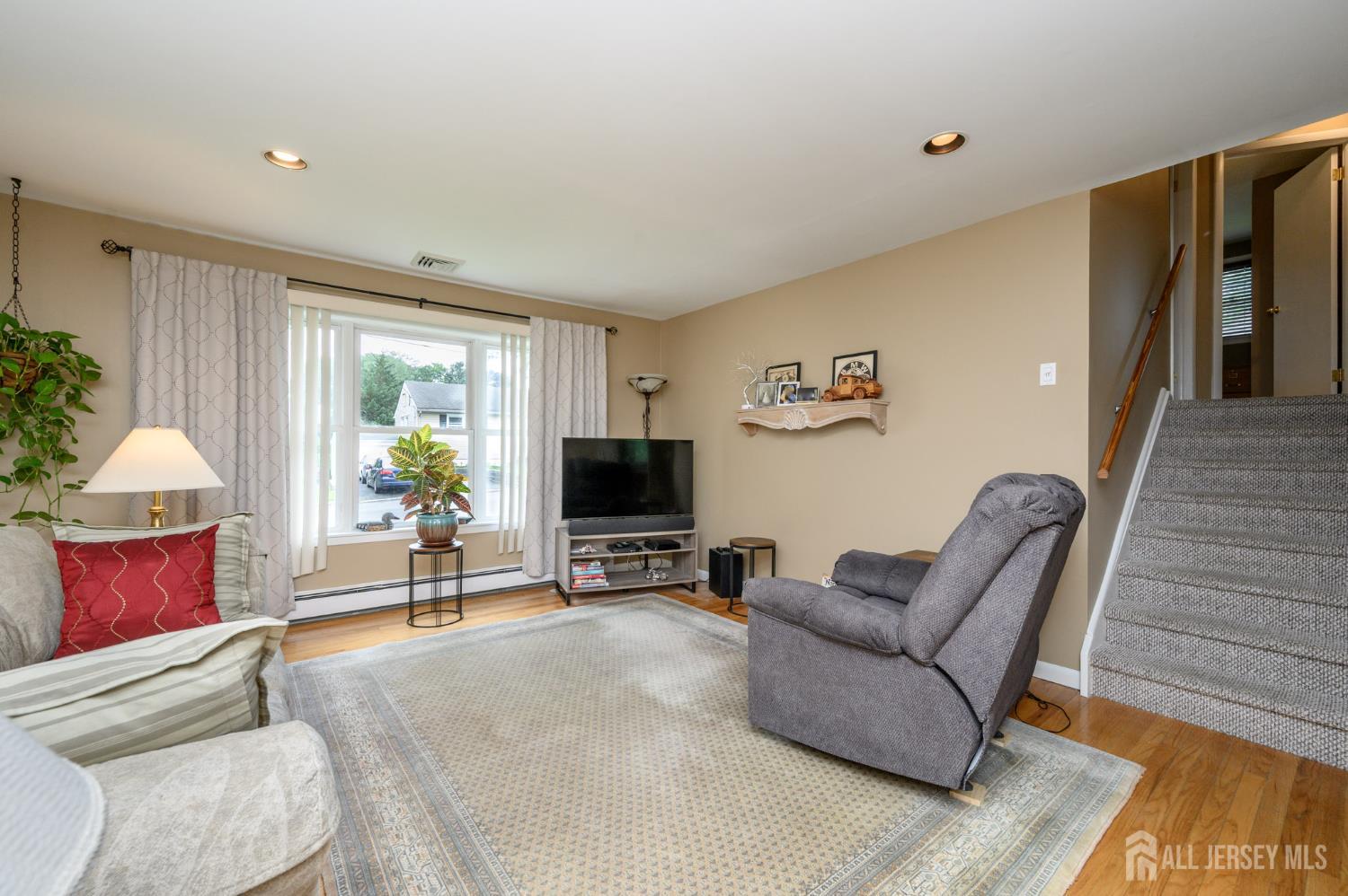 5 Locust Street Netcong, NJ 07857 - Photo 5 of 34 a living room with furniture and a flat screen tv