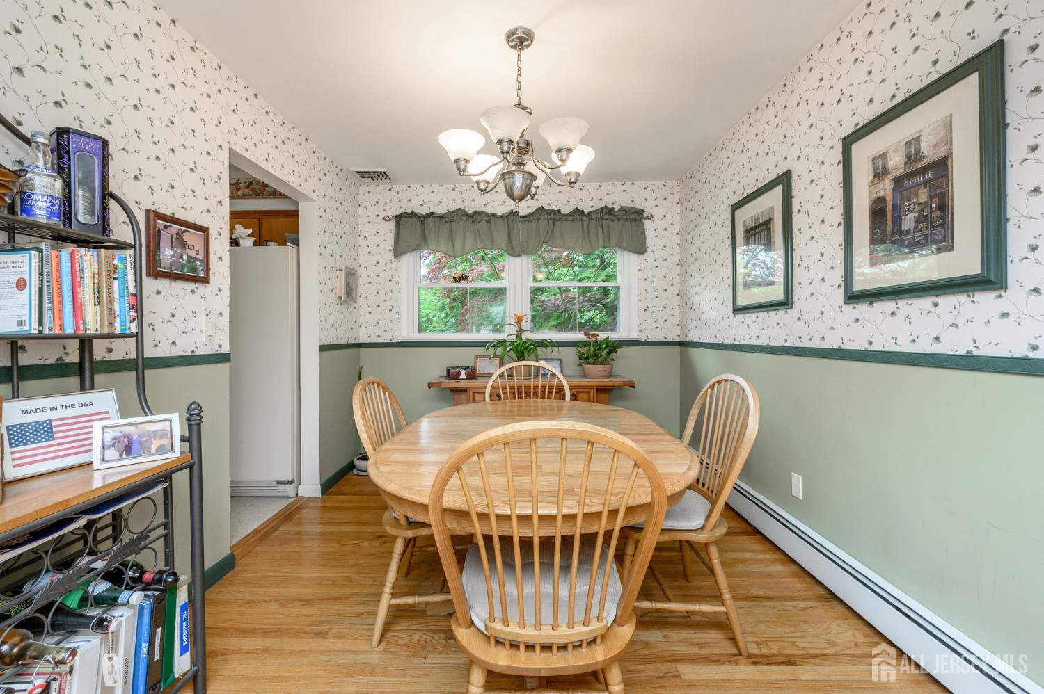 5 Locust Street Netcong, NJ 07857 - Photo 9 of 34 a dining room with furniture a chandelier and wooden floor
