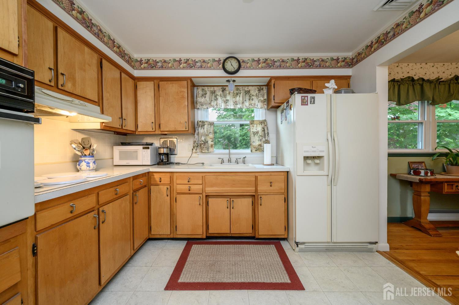 5 Locust Street Netcong, NJ 07857 - Photo 10 of 34 a kitchen with stainless steel appliances granite countertop a refrigerator sink and cabinets