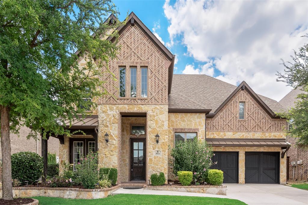 2021 Calisto Way Allen, TX 75013 - Photo 2 of 34 Stone and brick exterior with intricate brickwork patterns