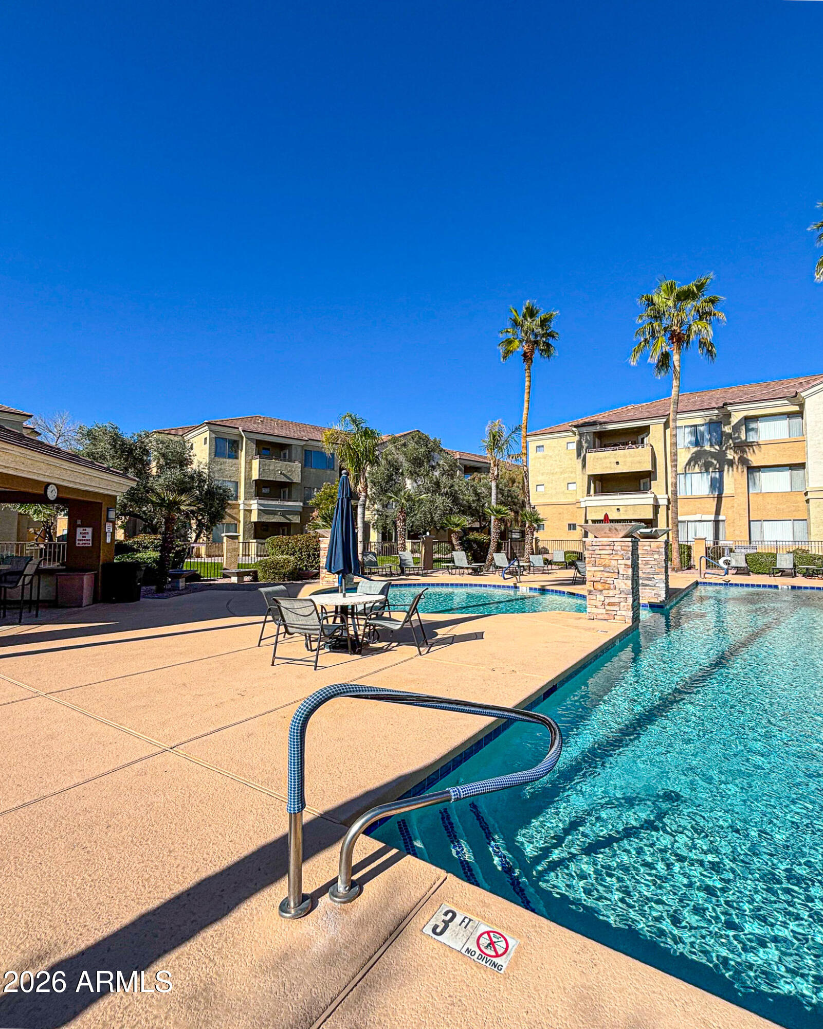18416 North Cave Creek Road, Unit 1003 Phoenix, AZ 85032 - Photo 22 of 25 a view of swimming pool with outdoor seating