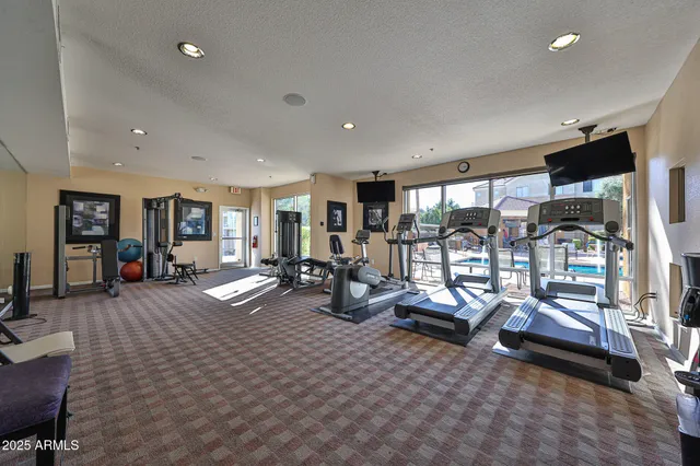 a view of a room with gym equipment