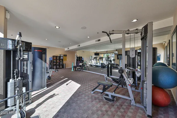 a view of a room with gym equipment