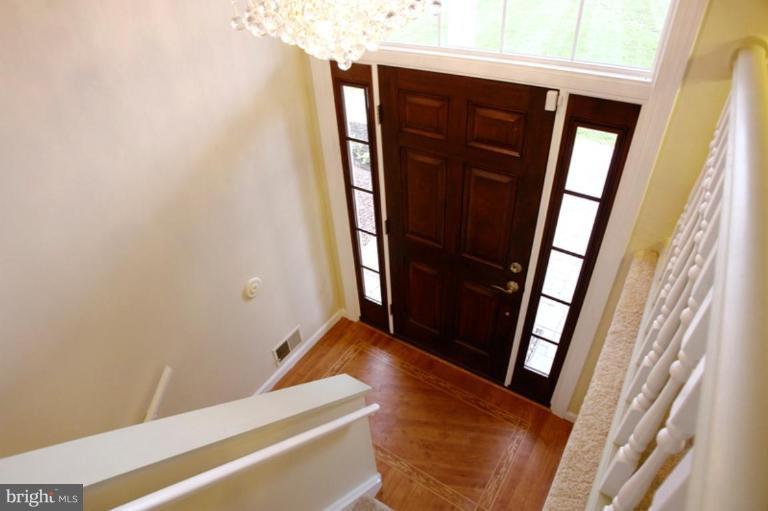 24408 Hanson Road Gaithersburg, MD 20882 - Photo 2 of 30 Split foyer leads to main floor and lower level.