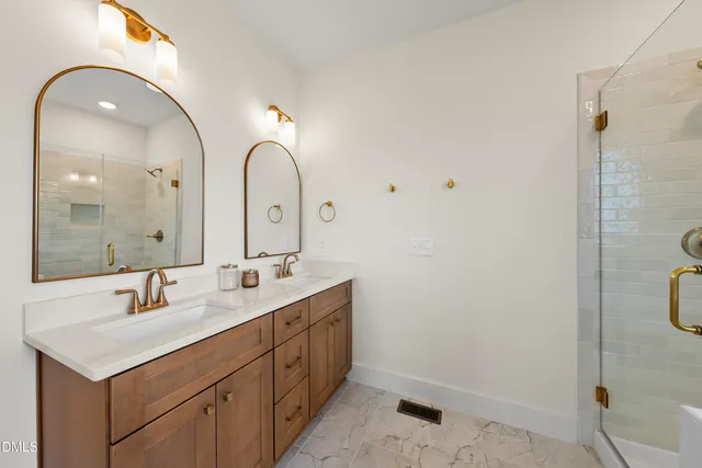 a bathroom with a tub and shower