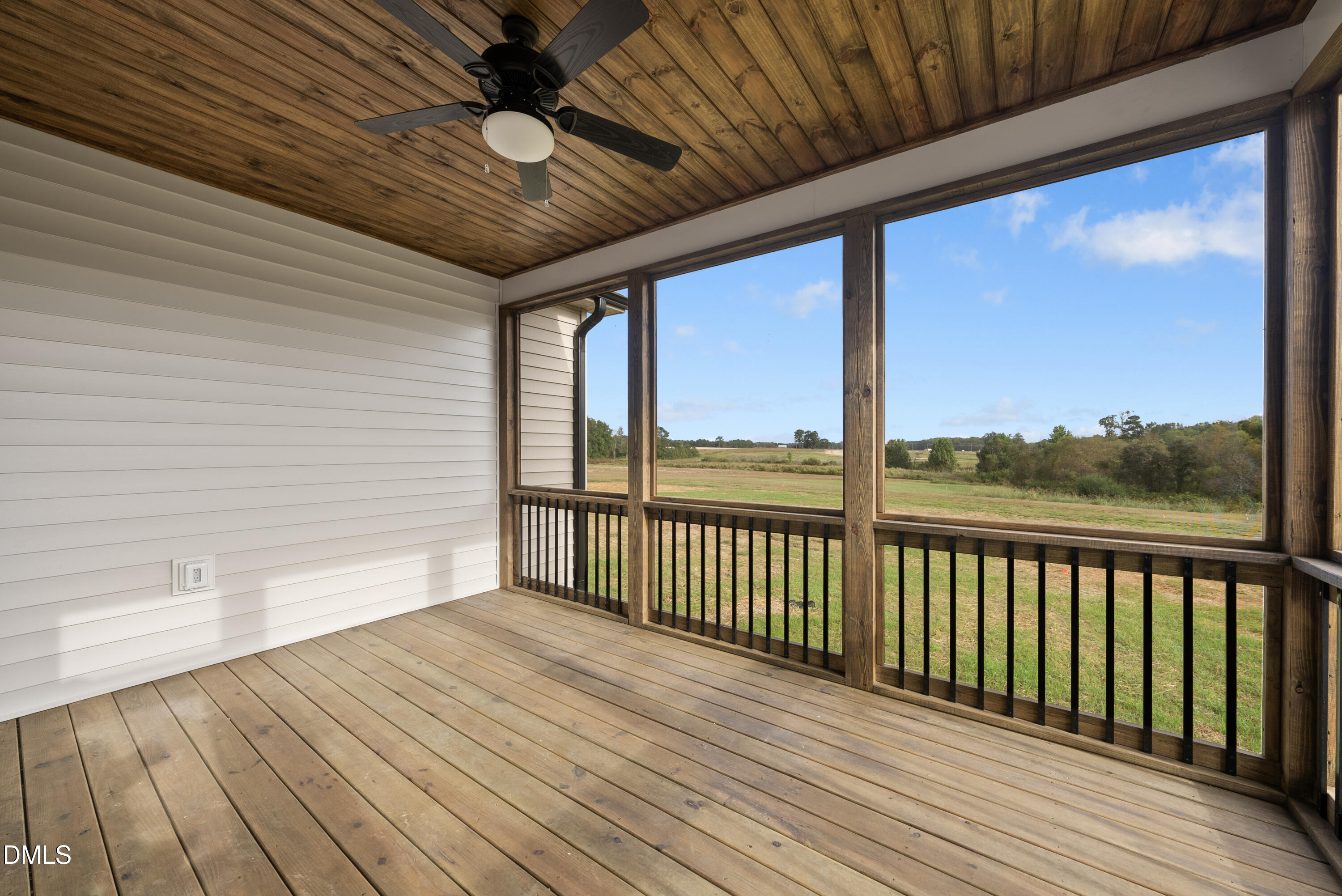 6786 Fire Tower Road Spring Hope, NC 27882 - Photo 28 of 30 a view of a balcony with wooden floor