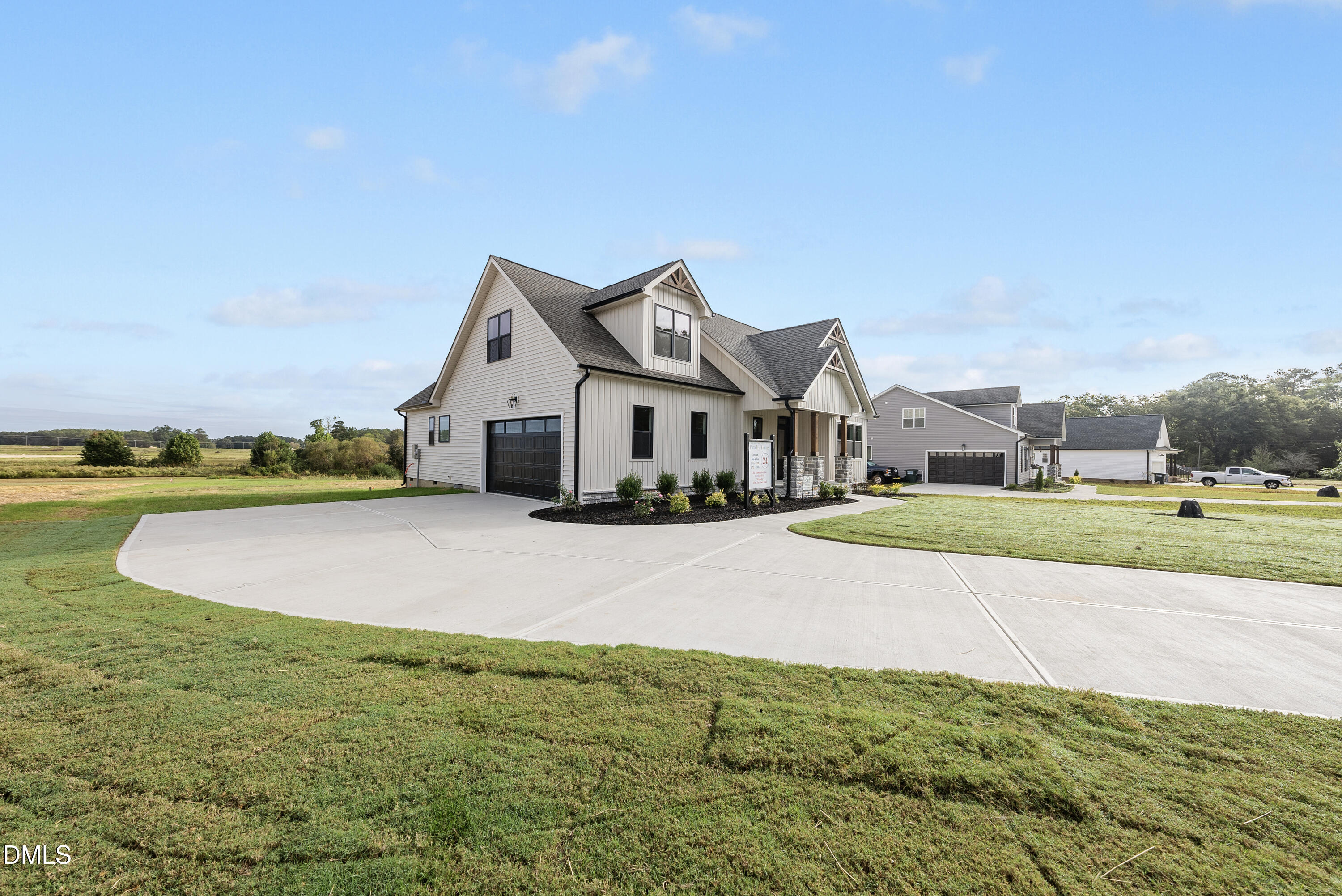 6786 Fire Tower Road Spring Hope, NC 27882 - Photo 29 of 30 a front view of a house with a yard