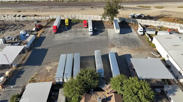 an aerial view of residential house with outdoor space