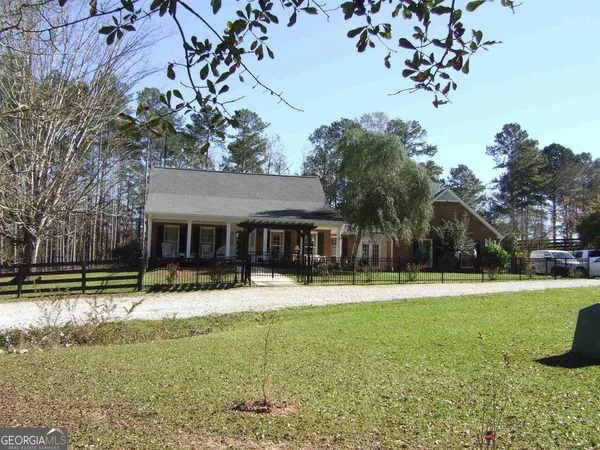 a house with garden in front of it