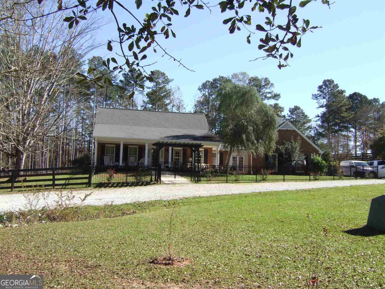 a house with garden in front of it