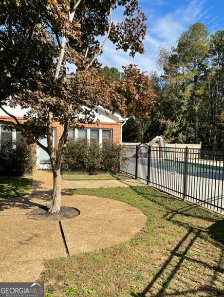 839 Sandy Creek Road Fayetteville, GA 30214 - Photo 16 of 22 a view of a backyard