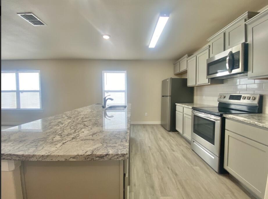 3111 Duke Street Lubbock, TX 79415 - Photo 4 of 17 IMG_5666 (1)