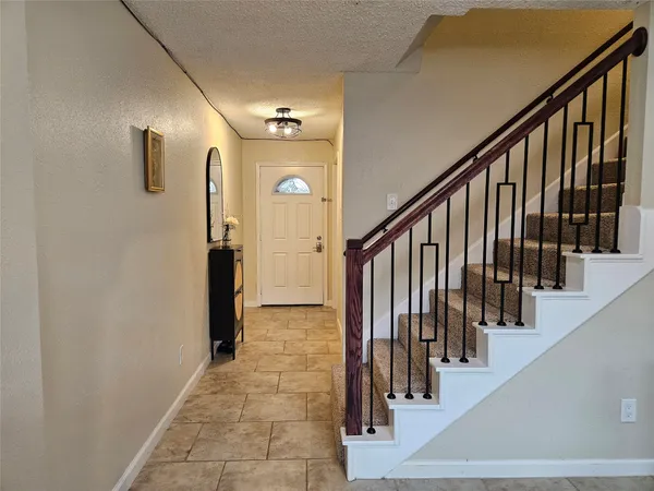 a view of hallway with stairs