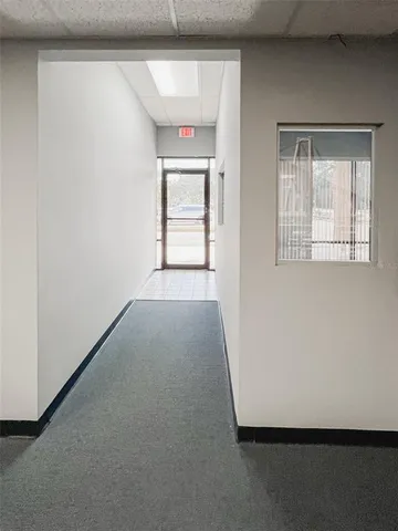 en empty room with windows