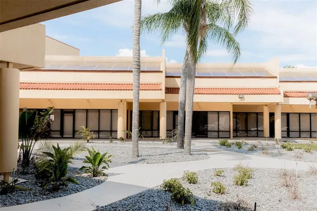 a view of a cars parked in front of a building