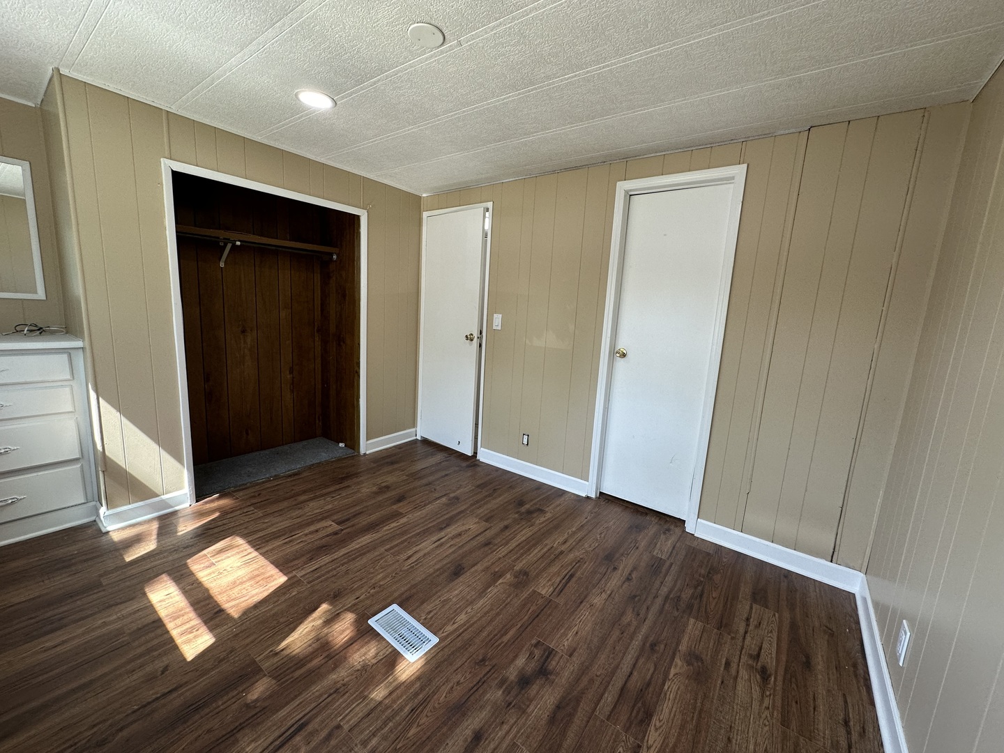 180 North Windmere Circle Matteson, IL 60443 - Photo 17 of 32 a view of an empty room and wooden floor